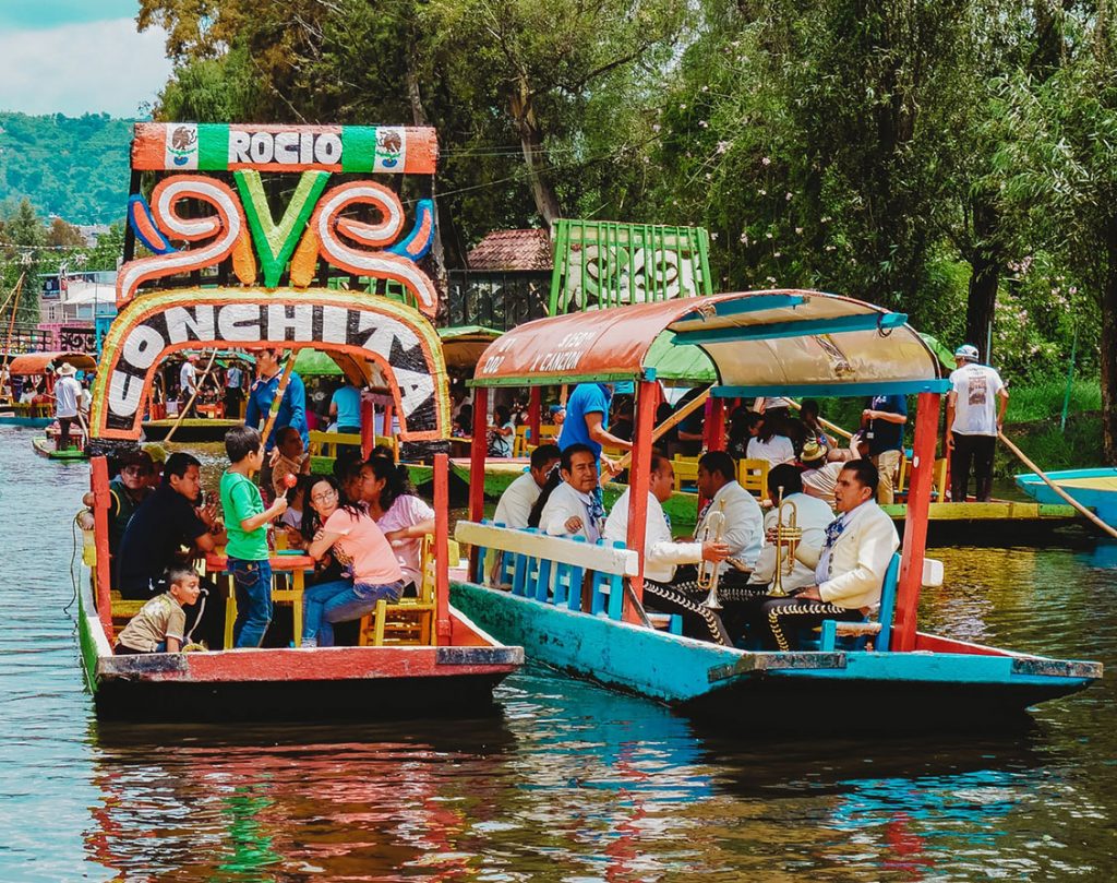 Trajinera Ride and Floating Lights at Xochimilco - Hostels Mundo Joven